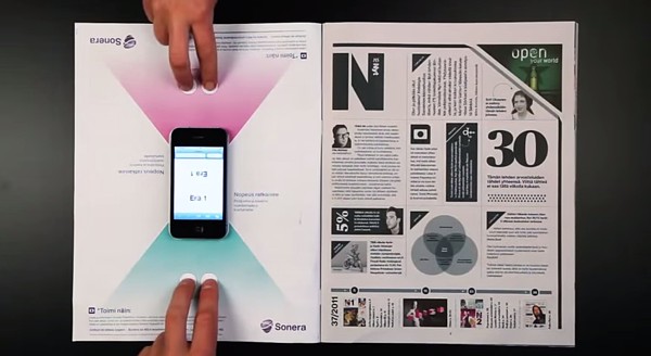 Interactive print ad by Sonera featuring smartphone board game.