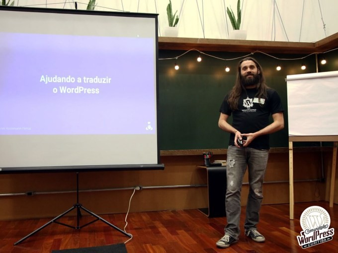 Daniel speaking at a meetup in Curitiba in 2016.
