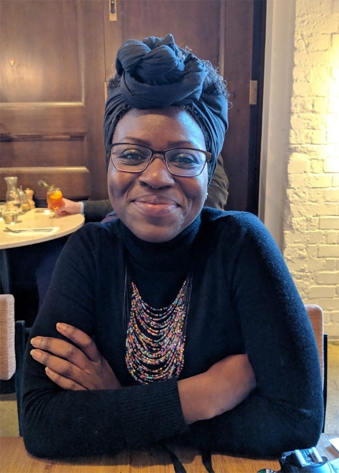 Hauwa in a cafe in 2015