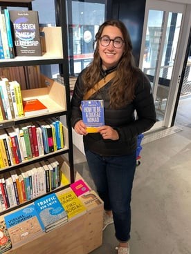 Kayla Ihrig with her book